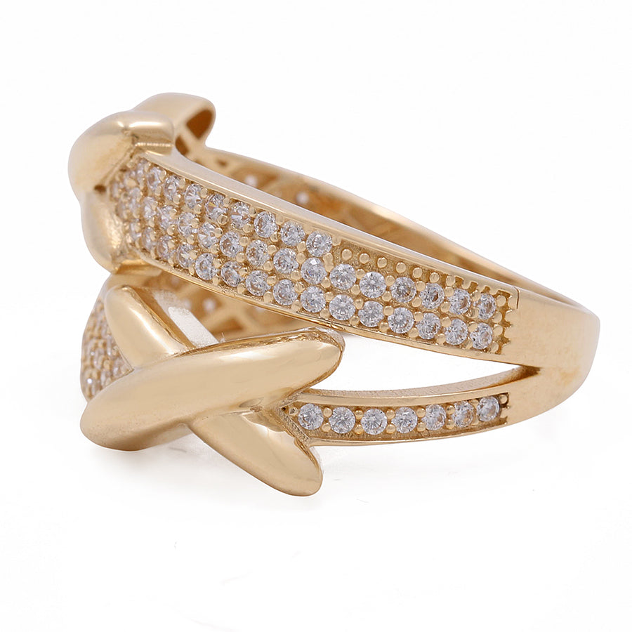 A luxury Miral Jewelry 14K yellow gold ring adorned with diamonds.