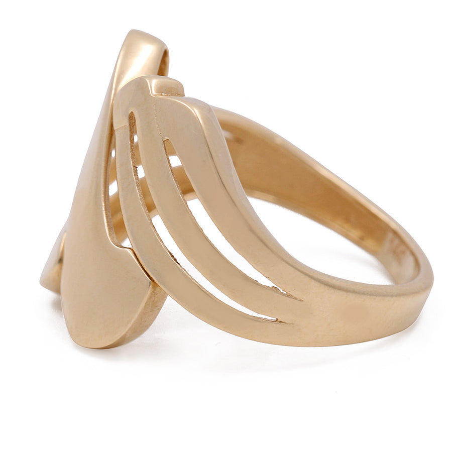 An elegant Miral Jewelry 14K Yellow Gold Women's Fashion Ring with a curved design.