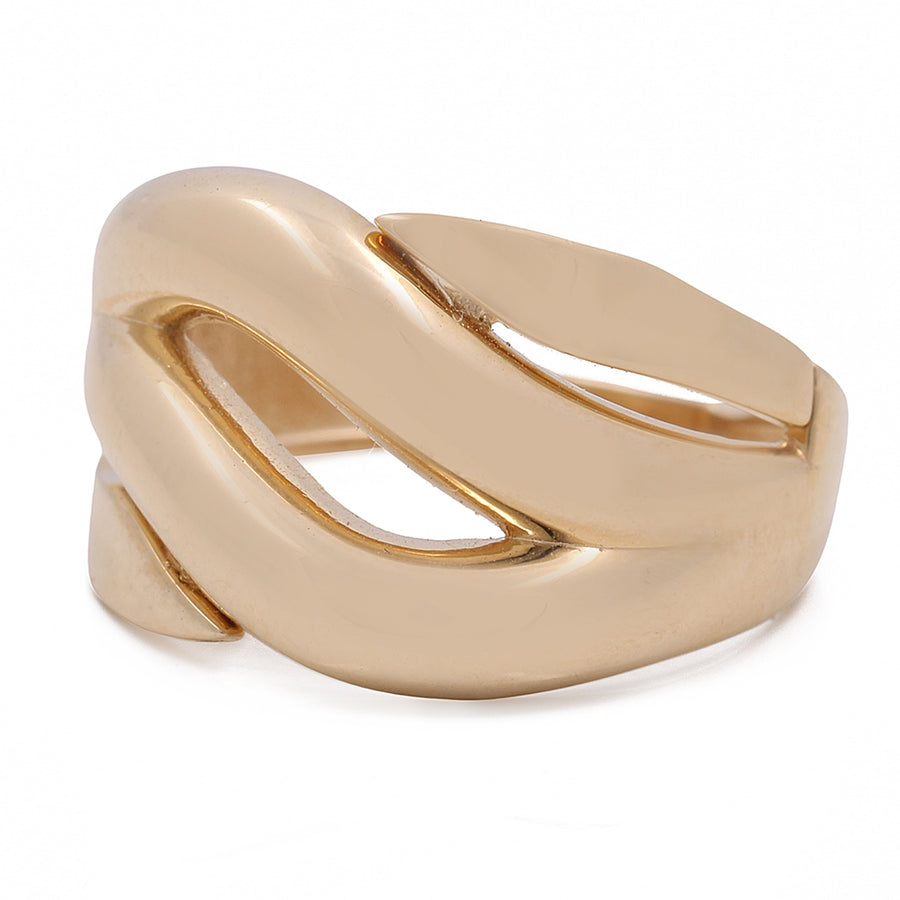 A 14K Yellow Gold Women's Fashion Ring with a twisted design from Miral Jewelry.