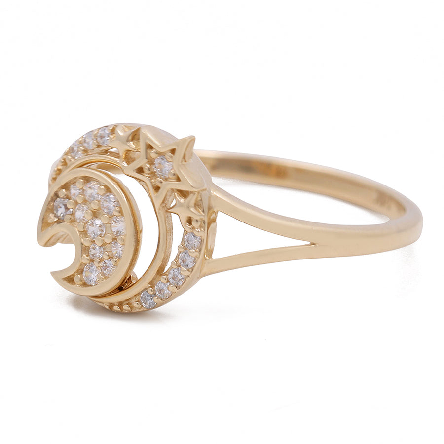A Miral Jewelry 14K Yellow Gold Women's Fashion Moon and Stars Ring with Cubic Zirconias, adorned in 14K yellow gold.