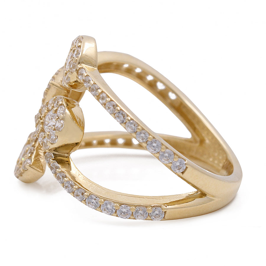 A Miral Jewelry 14K Yellow Gold Women's Fashion Ring with Cubic Zirconias in the center.