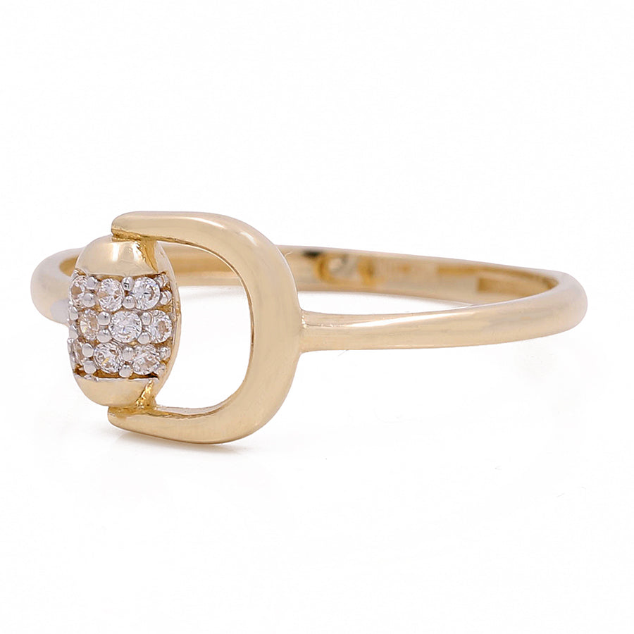 A Miral Jewelry 10K Yellow Fashion Ring with Cubic Zirconias in the center.