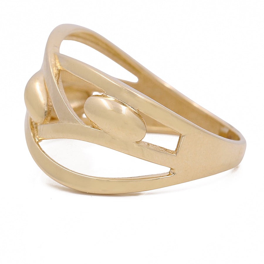 This elegant Miral Jewelry 10K Yellow Fashion Looped Ring is a stunning accessory with an open design.