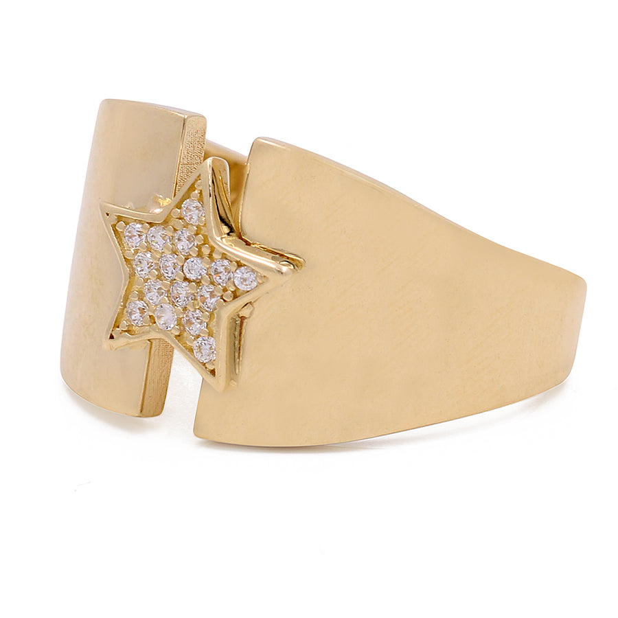 This Miral Jewelry luxury yellow gold star ring is adorned with sparkling diamonds.