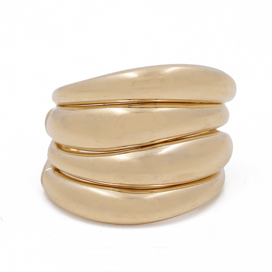 A stack of shiny Miral Jewelry 14K Yellow Gold Fashion Women's Rings, featuring a luxury jewelry appeal, on a white background.