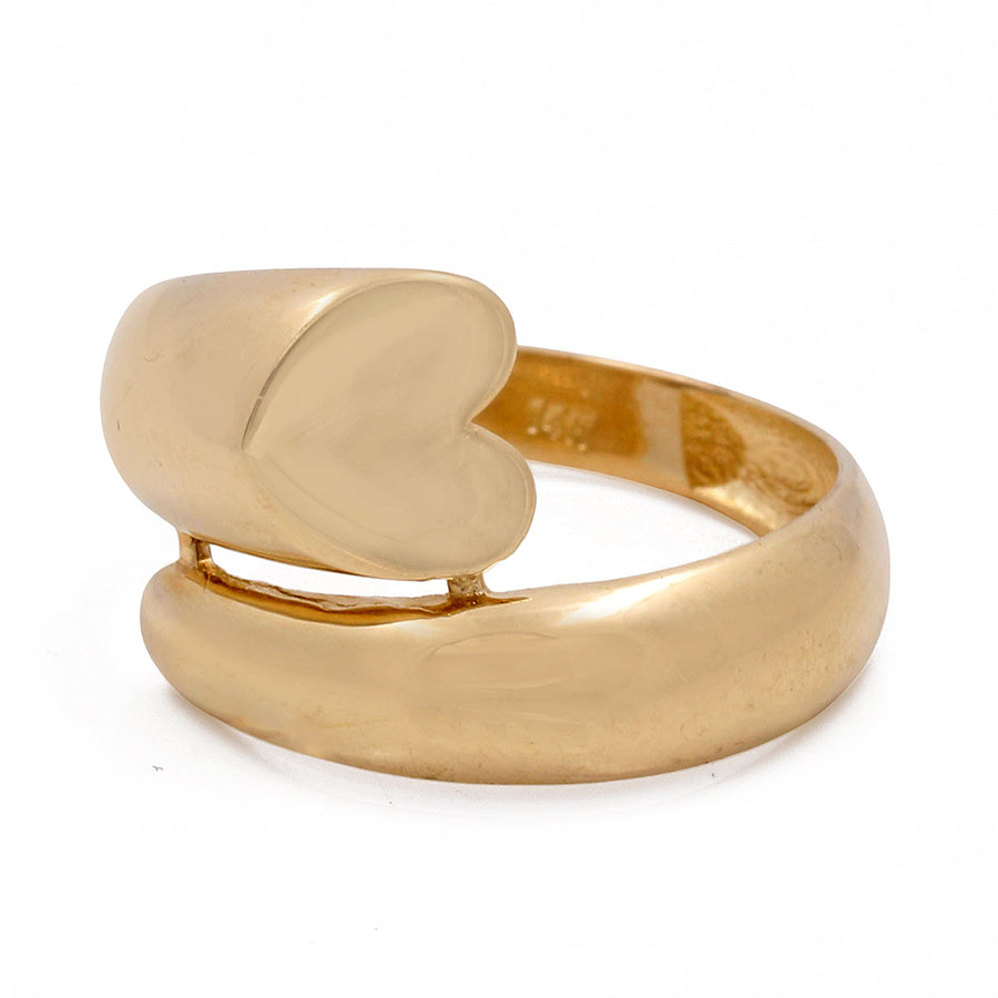 Miral Jewelry's 14K Yellow Gold Fashion Heart Women's Ring with a heart-shaped design on a white background.