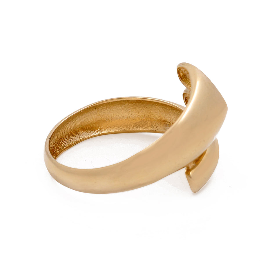 Miral Jewelry's Gold-tone 14K yellow gold ring with a unique curved design on a white background.