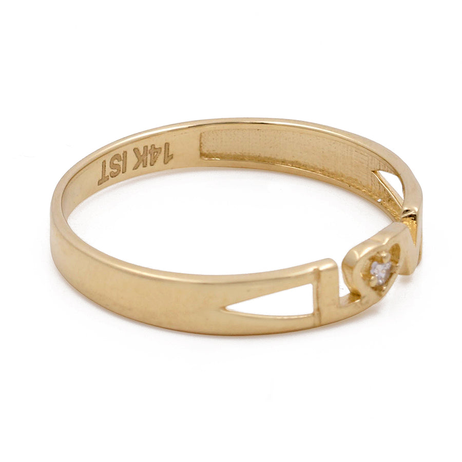 Miral Jewelry's Women's Fashion Gold ring with a single diamond inset, viewed from the side.