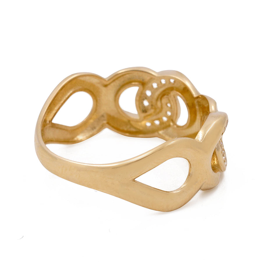 Miral Jewelry's 14K Yellow Gold Fashion Butterfly Women's Ring with Cubic Zirconias, featuring an interlocking hearts design, against a white background.