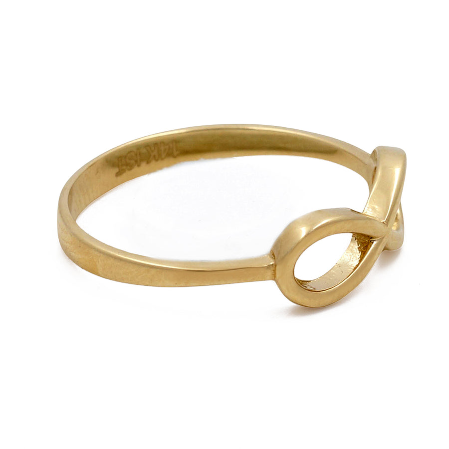 Miral Jewelry's 14K Yellow Gold Infinity Women's Ring with looped infinity knot design on a white background.