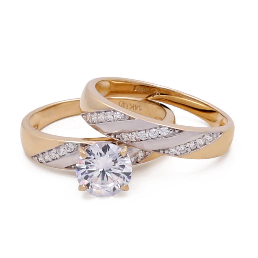 A pair of Miral Jewelry 14K yellow gold wedding rings, one with a central diamond and stone-studded band.