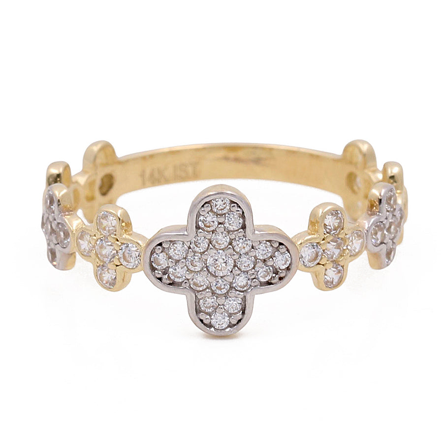 A Miral Jewelry 14k yellow gold bracelet featuring a diamond-encrusted butterfly design in the center.