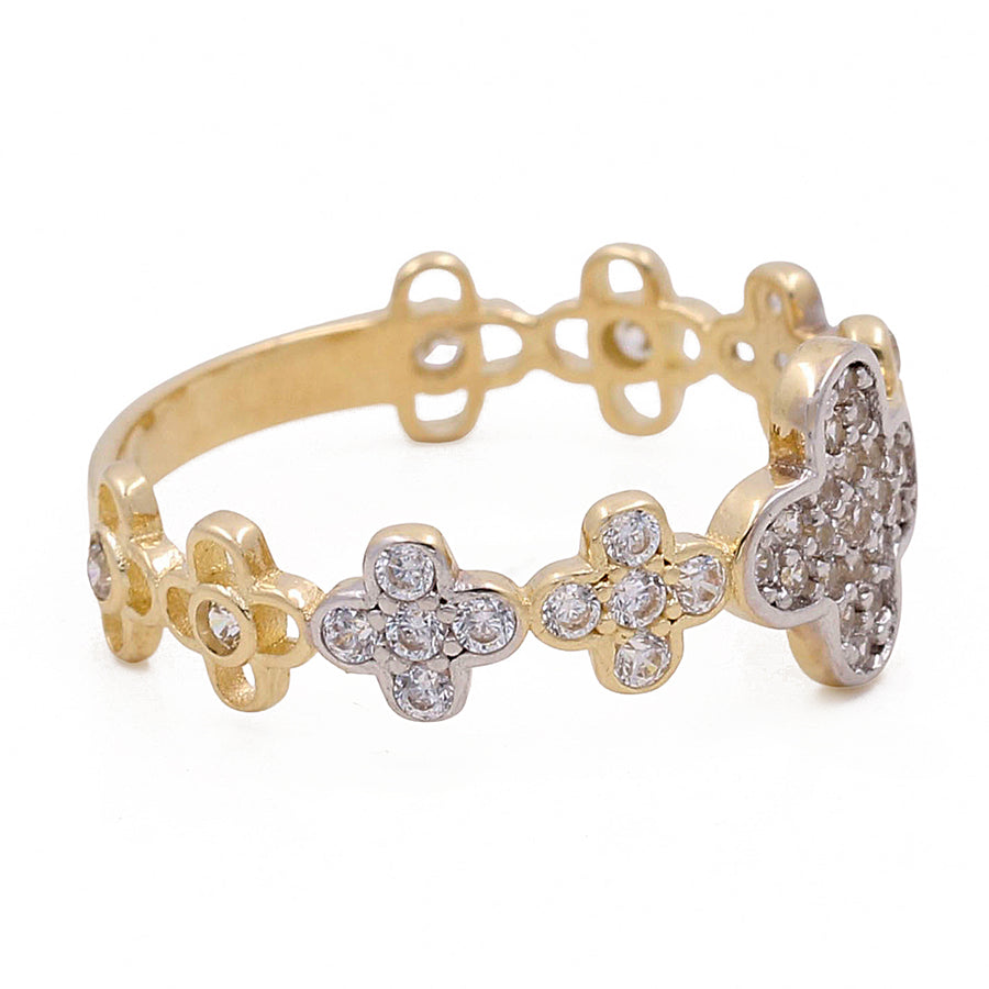 Miral Jewelry's gold bracelet with a heart-shaped charm embellished with diamonds and a linked chain design in 14K yellow gold with floral motifs.