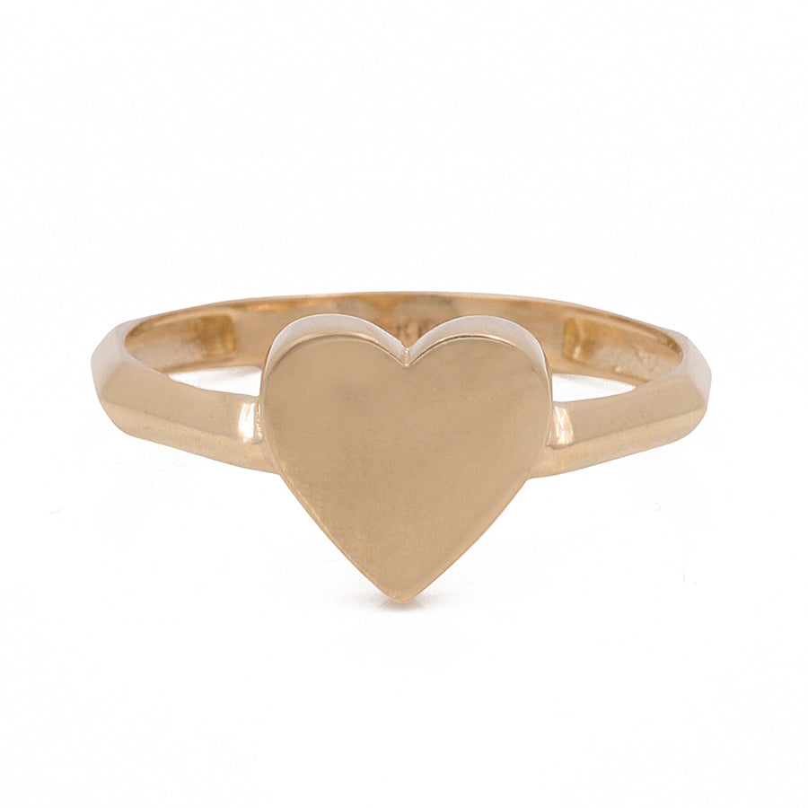Miral Jewelry's 14K Yellow Gold Heart Ring displayed against a white background.