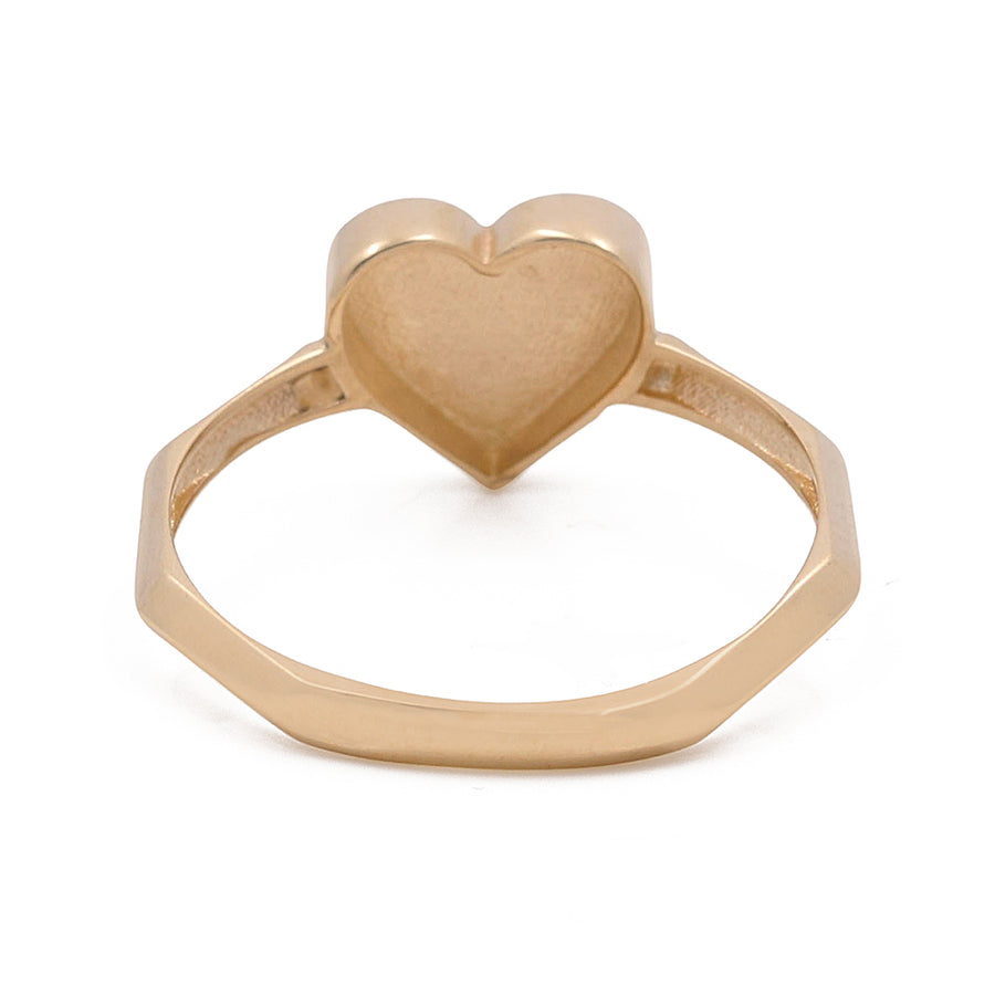 Miral Jewelry's 14K Yellow Gold Heart Ring featuring a single heart-shaped setting in 14K yellow gold, displayed against a white background.