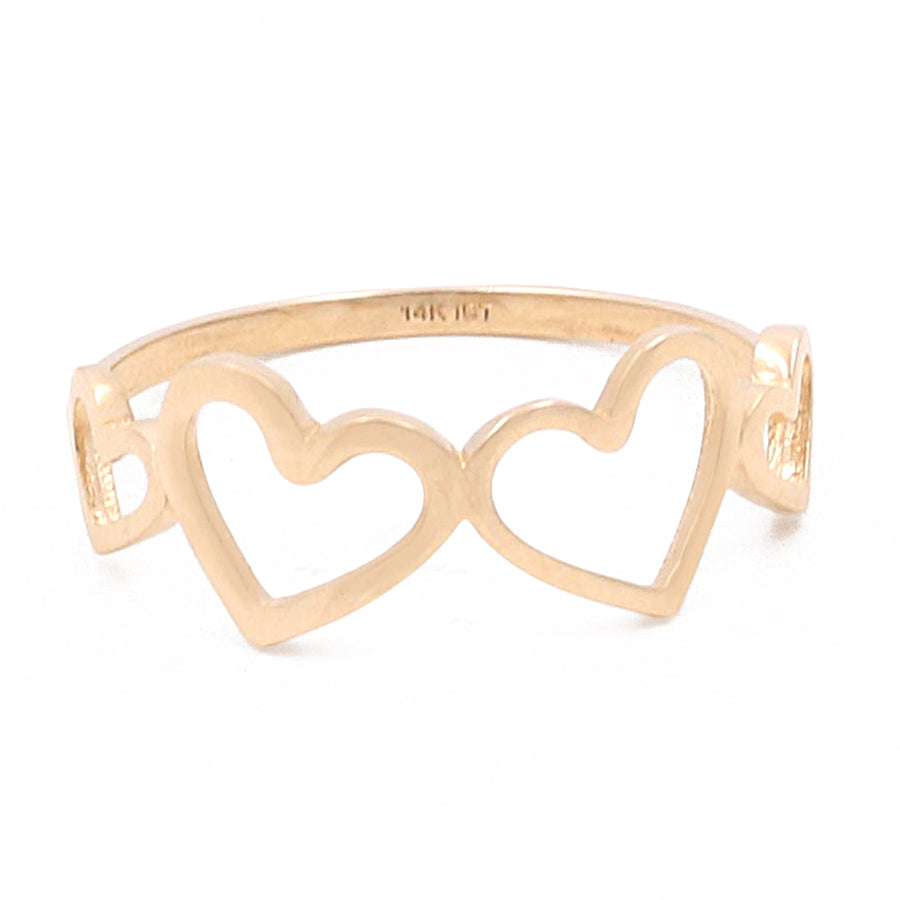 A 14K yellow gold hearts ring featuring three connected heart shapes, crafted from 14K yellow and white gold, displayed against a white background by Miral Jewelry.