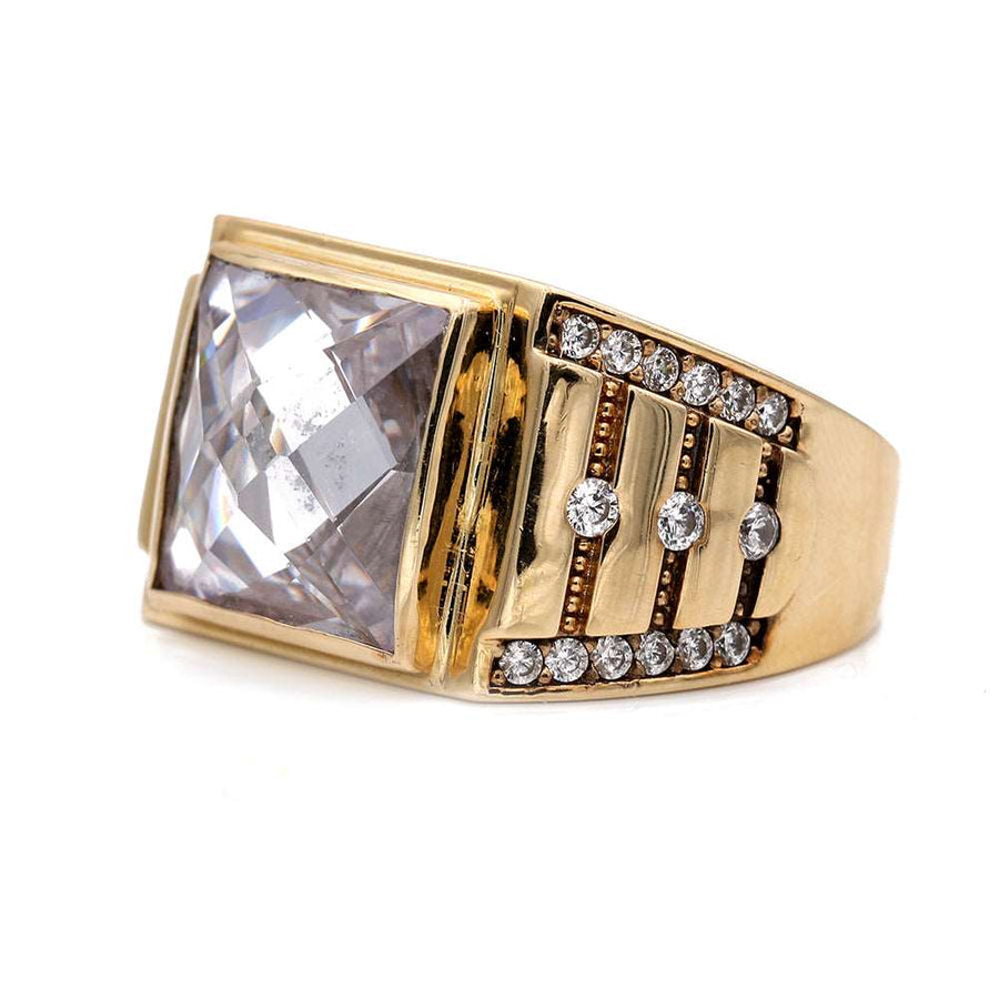 A men's Miral Jewelry Yellow Gold 14k Fashion Ring featuring a square CZ stone set on a yellow gold band, with additional diamond accents.