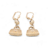 Introducing the 14K Yellow Gold Handbag Drop Women's Earrings by Miral Jewelry—these fashion-forward earrings boast handbag-shaped charms with intricate ribbed detailing and secure lever-back closures, adding a touch of luxury and elegance to any outfit.