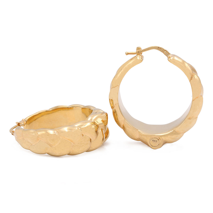 These Miral Jewelry 14Kt Yellow Gold Medium Hoop Earrings exude timeless beauty.