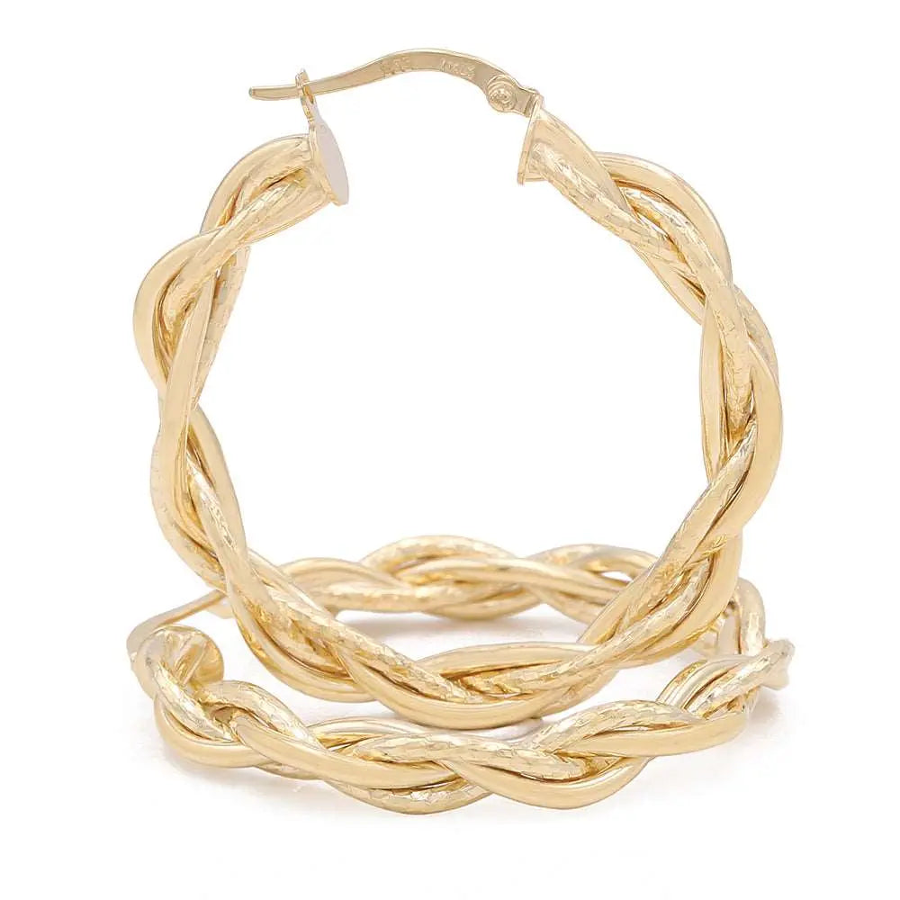 A pair of luxury Miral Jewelry 14K Yellow Gold Twisted Hoop Earrings.
