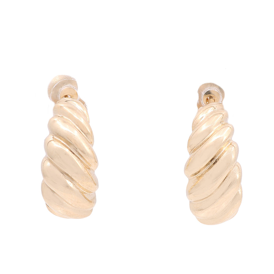 A pair of Miral Jewelry 14k yellow gold plated twisted hoop fashion earrings.