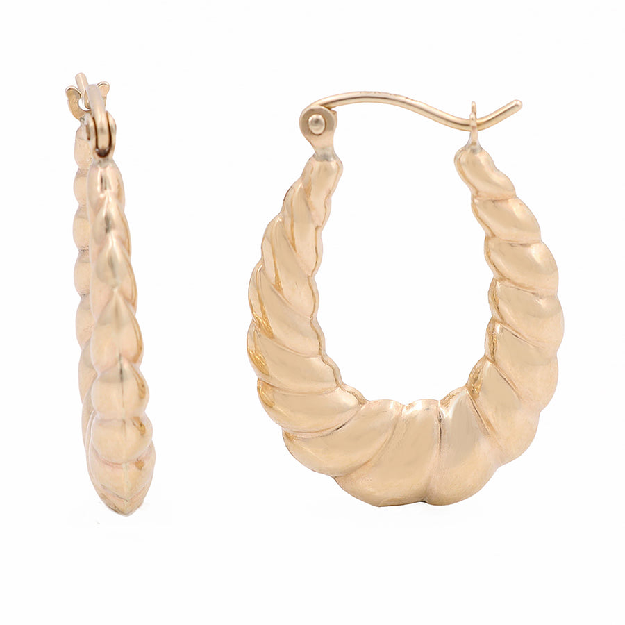 A pair of Miral Jewelry 10K Yellow Gold hoop earrings designed with timeless elegance.