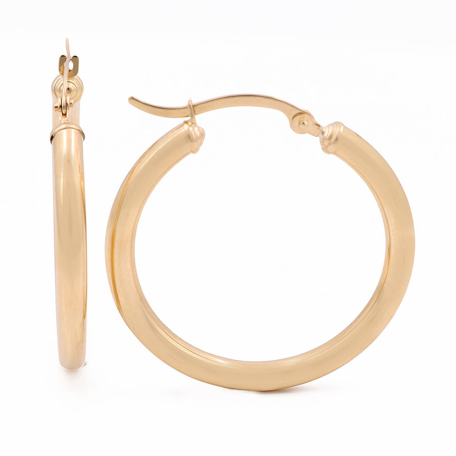 A pair of Miral Jewelry 10K Yellow Gold Hoop Earrings.