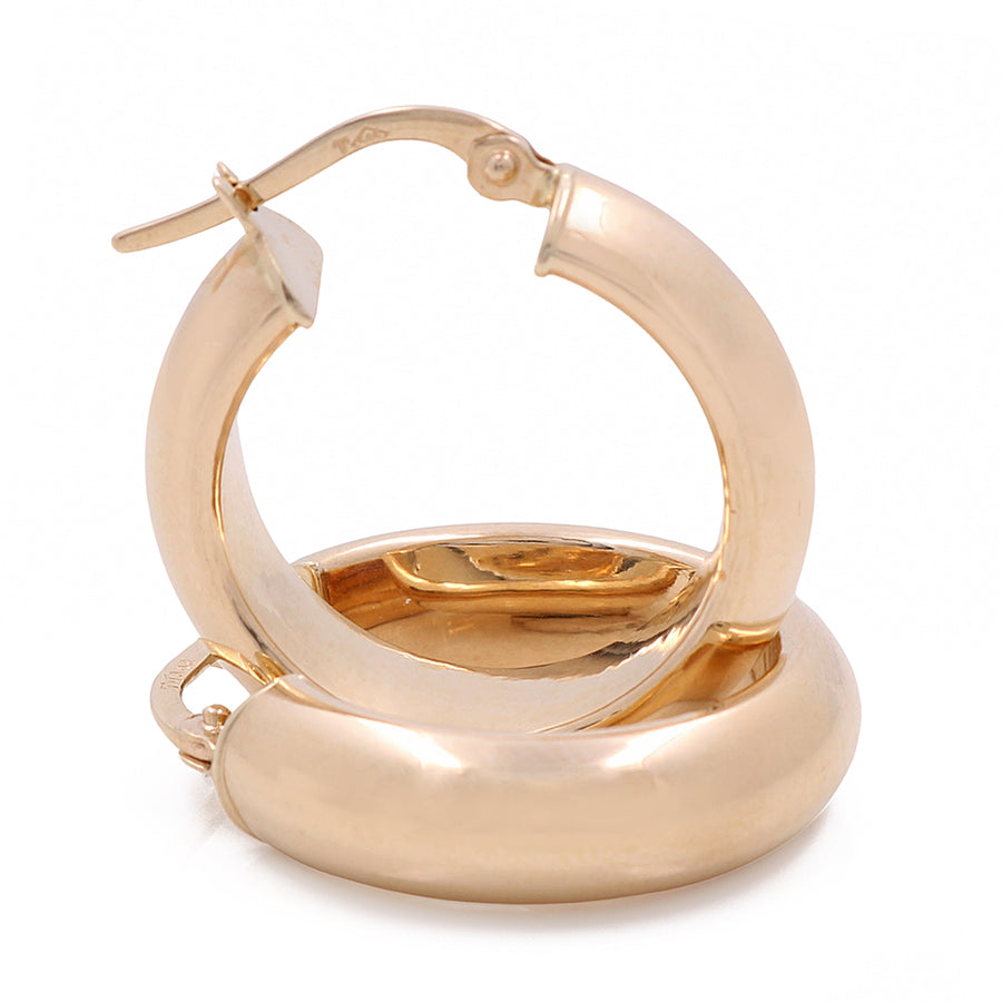 Fashion Hoop Earrings in Miral Jewelry's 14K Yellow Gold on a white background.