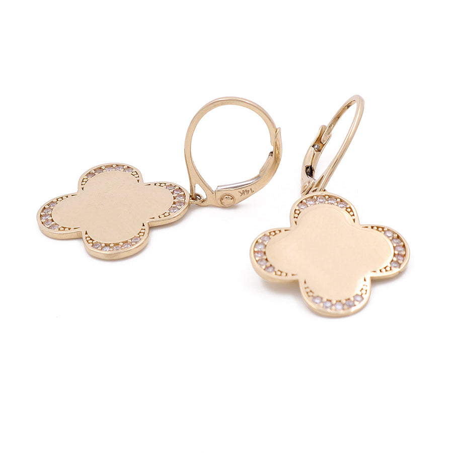 A pair of Miral Jewelry 14K yellow gold fashion flowers with cubic zirconias earrings.