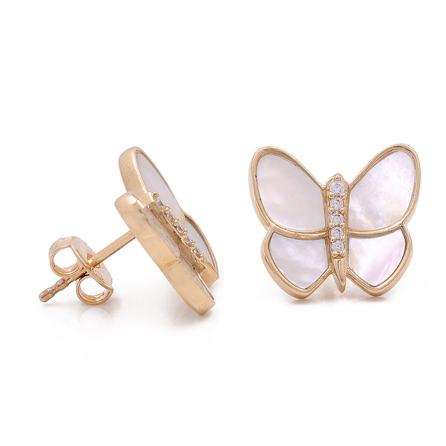 Mother of pearl and diamond butterfly stud earrings crafted in Miral Jewelry's 14K Yellow Gold, a stunning statement piece for any fashion-forward individual.