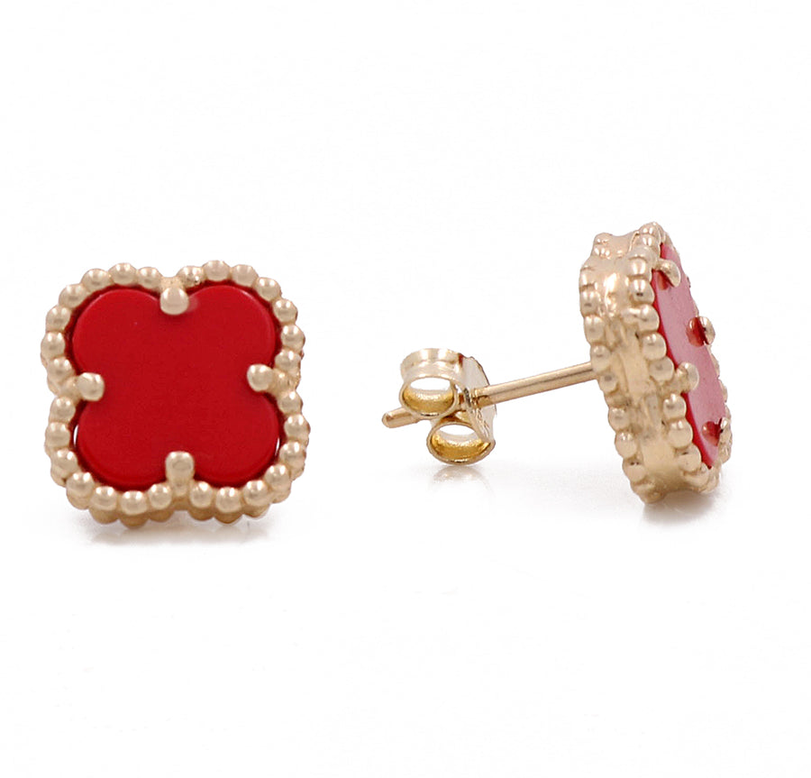 These Miral Jewelry women's stud earrings feature 14K yellow gold plating and vibrant red enamel.