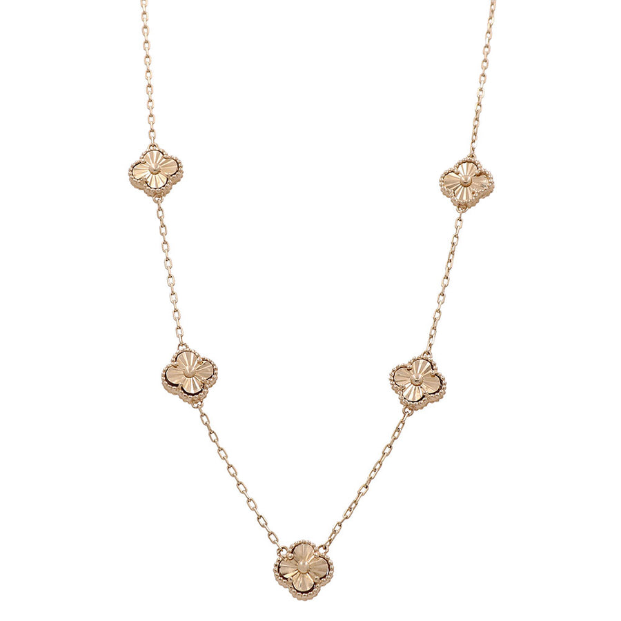 A fashionable necklace with three Miral Jewelry 14K Yellow Gold Fashion Flower Women's Necklace pendants.