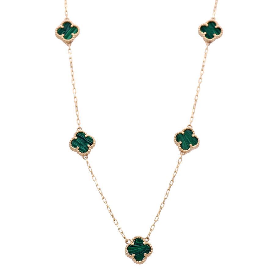 A fashion-forward emerald leaf necklace featuring exquisite green stones set in the Miral Jewelry 14K Yellow Gold Fashion Flower Women's Necklace.