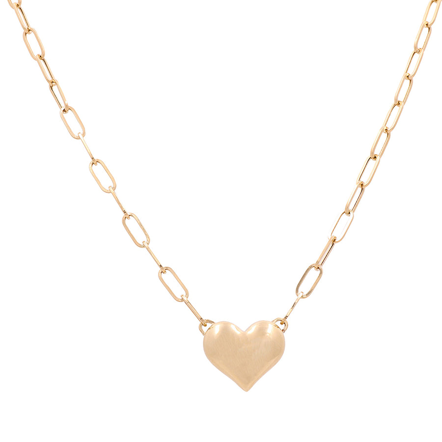 A Miral Jewelry 14K Yellow Gold Fashion Heart Necklace with a heart shaped pendant.