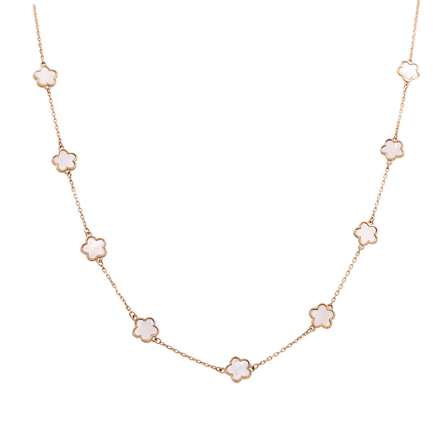 A Miral Jewelry fashion necklace with white opal stones and 14K yellow gold accents.