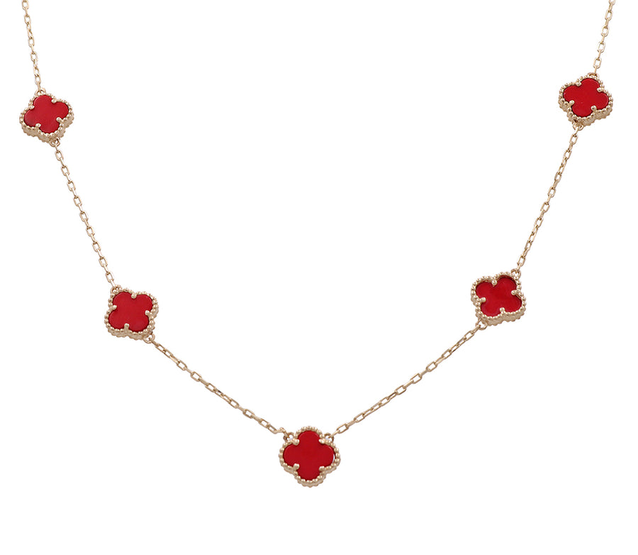 A Miral Jewelry necklace with red enamel leaves and a 14K yellow gold chain.