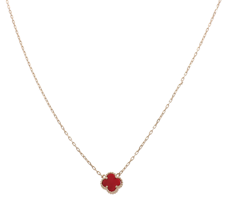 A Miral Jewelry 14K Yellow Gold Fashion Flower Women's Red Stone Necklace with a red clover on a gold chain.