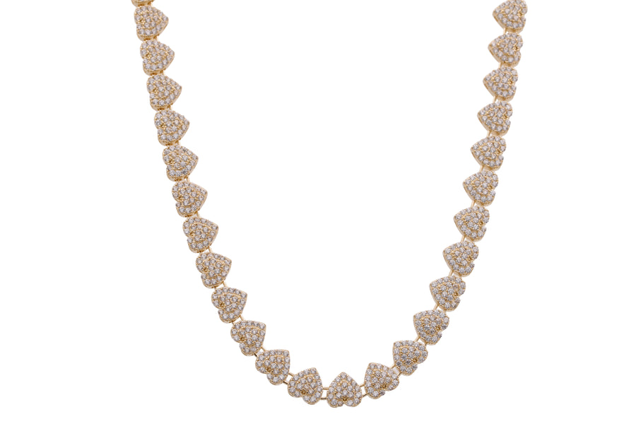 Miral Jewelry's 14K Yellow Gold Hearts Necklace with Cubic Zirconias, adorned with round and floral-shaped clusters of small diamonds, displayed against a white background.
