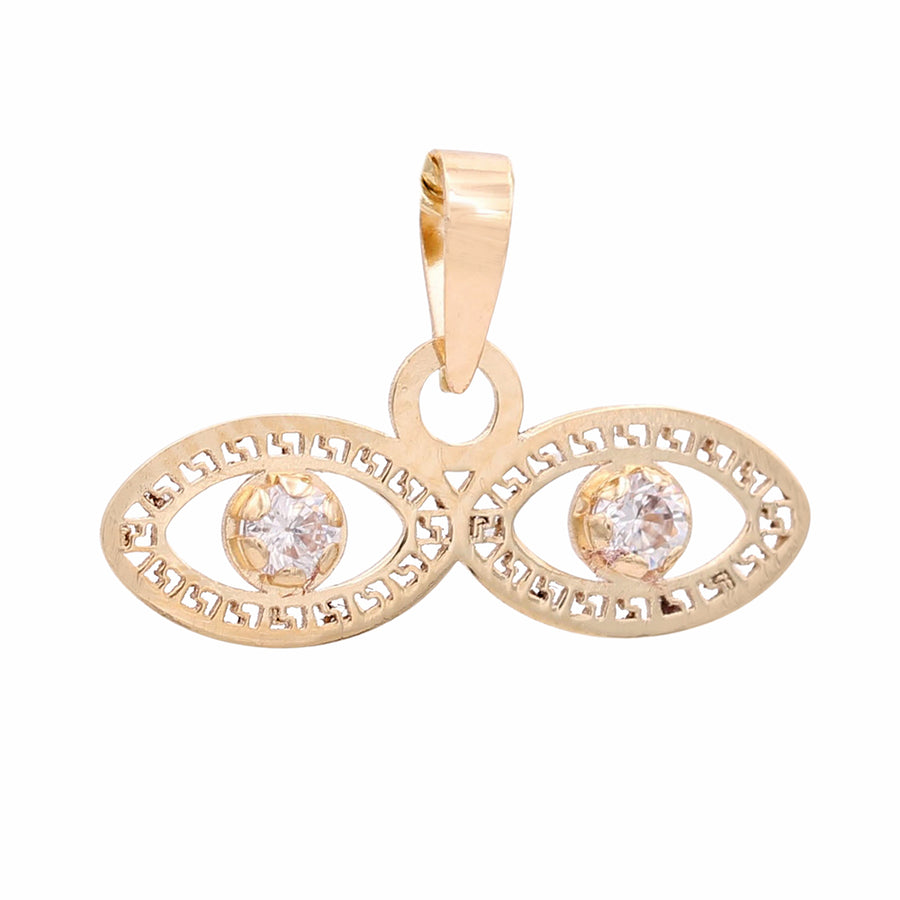 A Miral Jewelry Yellow Gold 14K Ojos de Santa Lucia Pendant featuring a diamond at the center.