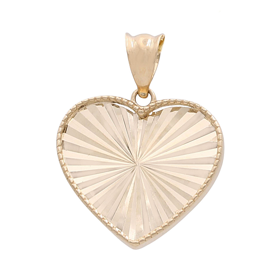 A Miral Jewelry 14K Yellow Gold Heart with Diamond Cut Pendant.