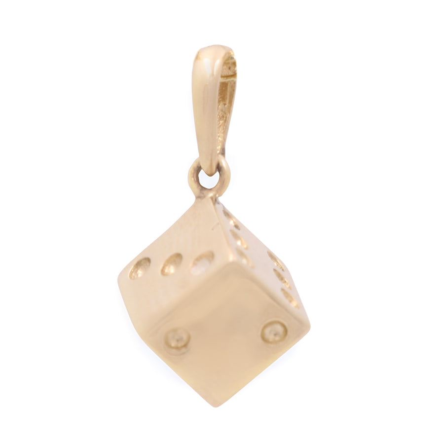A Miral Jewelry 14K yellow gold dice pendant on a white background.