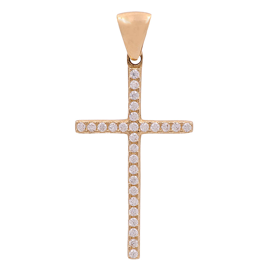An 14K Yellow Gold cross pendant with cubic zirconias from Miral Jewelry.