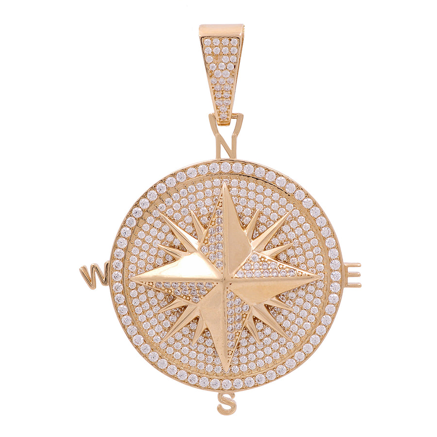 A 14K yellow gold compass pendant with cubic zirconias for a touch of elegance by Miral Jewelry.