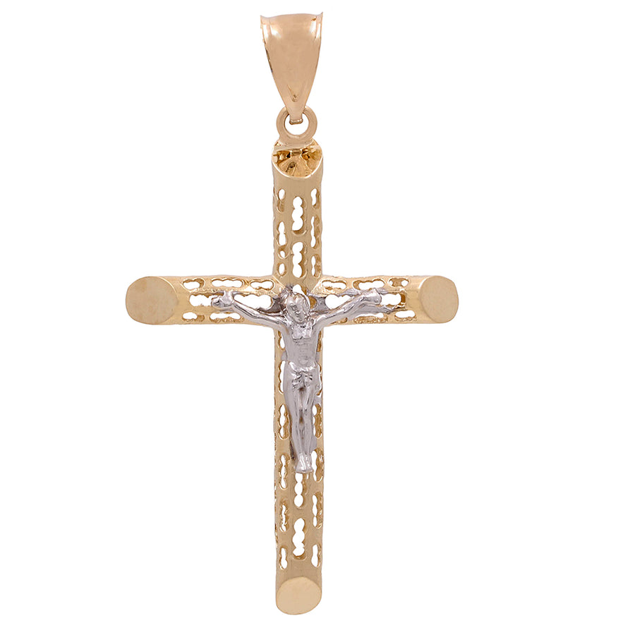 Gold crucifix pendant crafted in 14K yellow and white gold, with intricate lace-like details and a figure of Jesus on the cross by Miral Jewelry.
