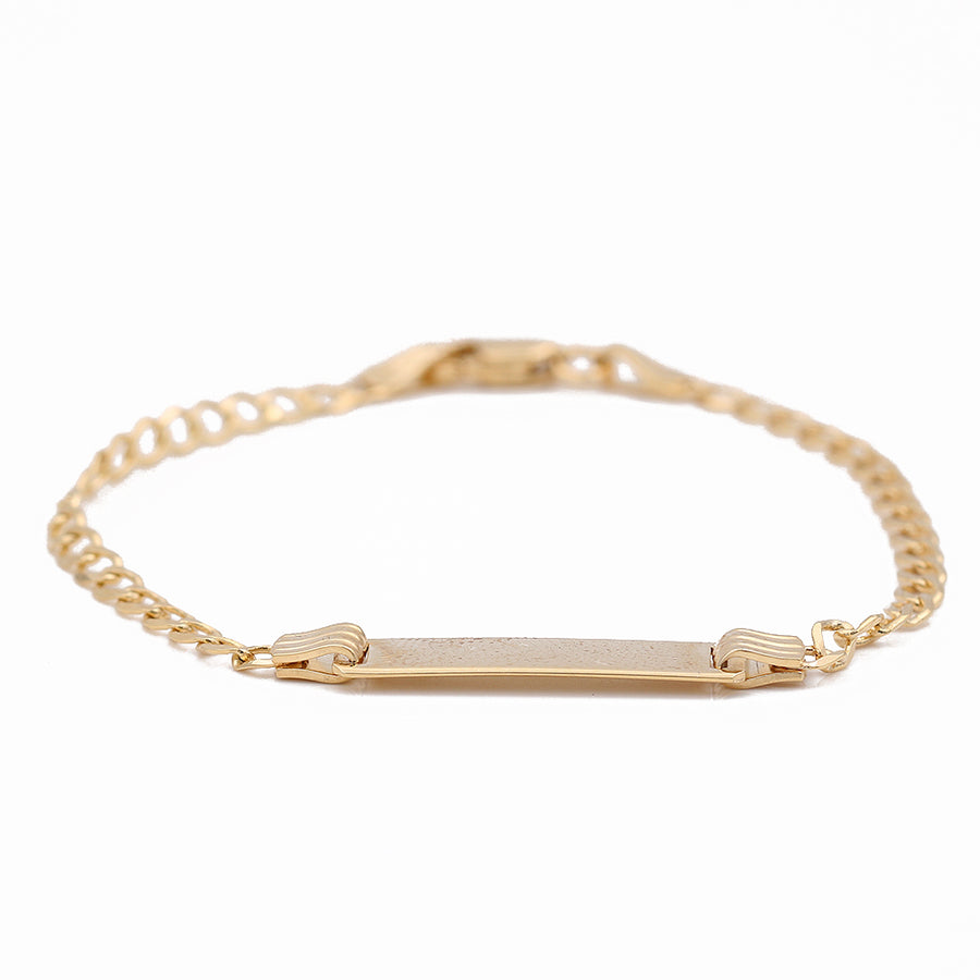 A kids' Miral Jewelry gold plated ID bracelet with an engraved bar in Kid's Yellow Gold 14K.
