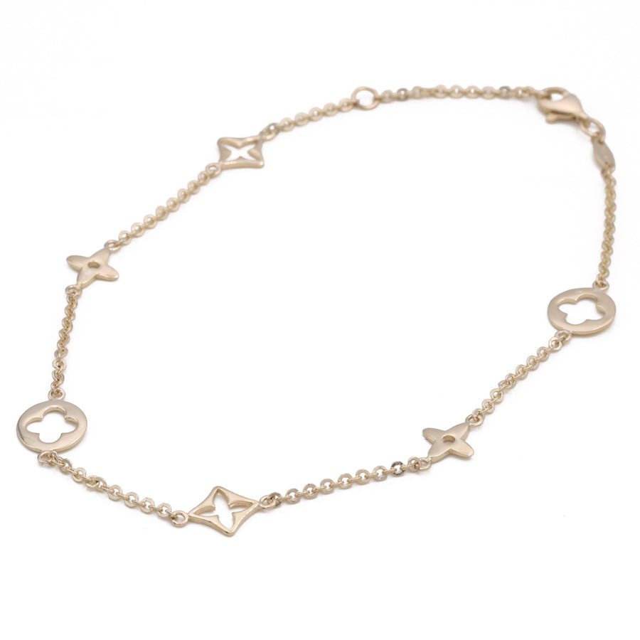 A luxurious Miral Jewelry 14K Yellow Gold Fashion Beads Bracelet adorned with stars and hearts.