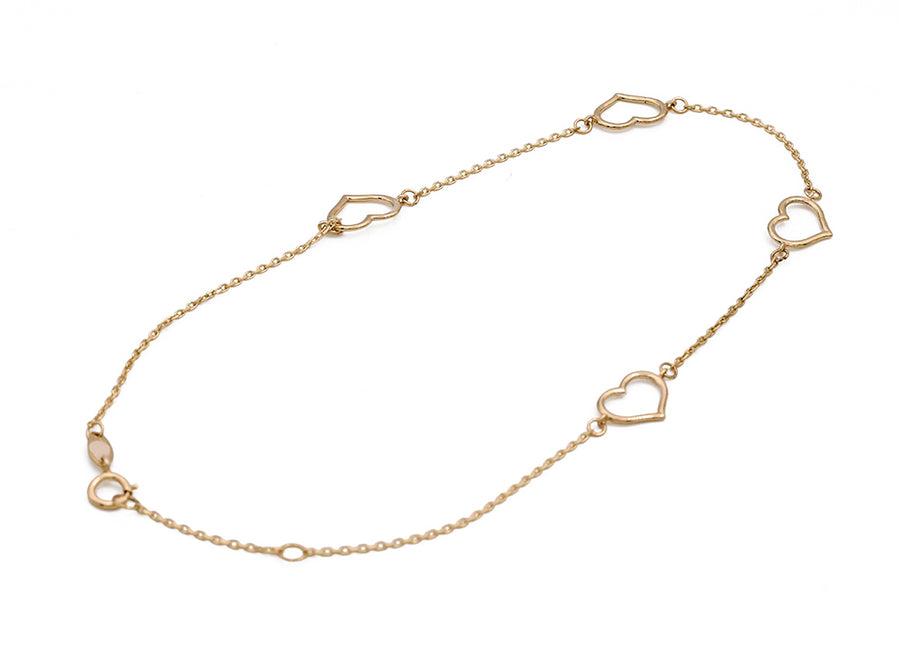 A Miral Jewelry yellow gold 14k fashion ankle bracelet with two hearts on it.