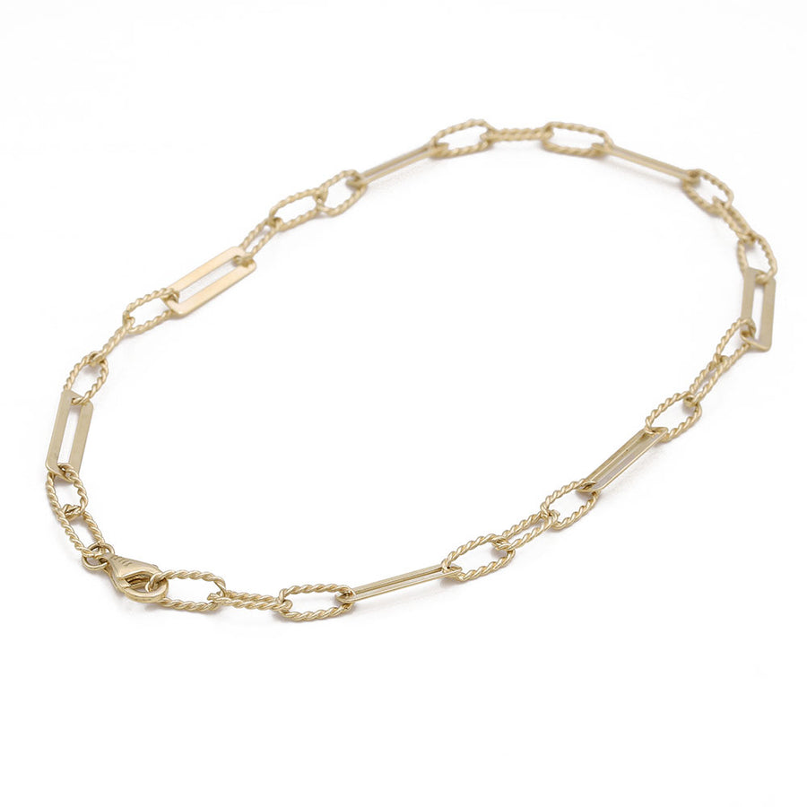 A fashion-forward Yellow Gold 14k Fashion Ankle Bracelet from Miral Jewelry with a clasp.