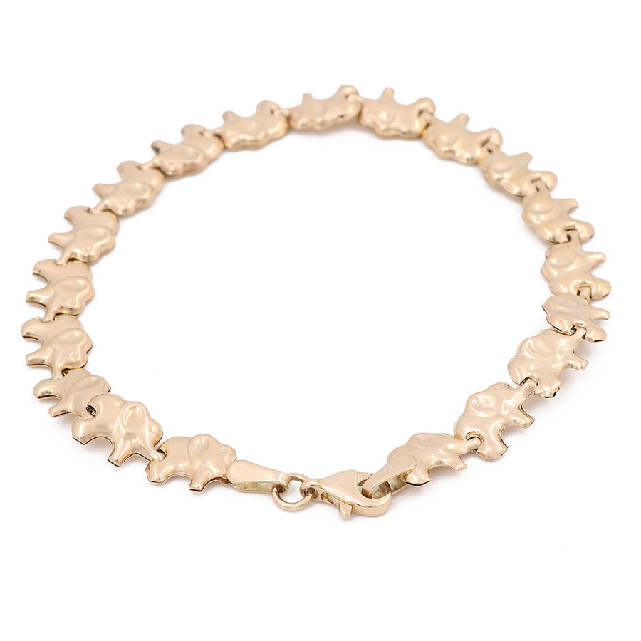 A timeless accessory, the Miral Jewelry Yellow Gold 14K Elephant Bracelet is a stunning 14k Yellow Gold Fashion Link Bracelet.