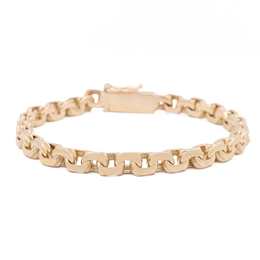 A Miral Jewelry Yellow Gold 14K Fashion Bracelet with a clasp, perfect for fashion-forward individuals.
